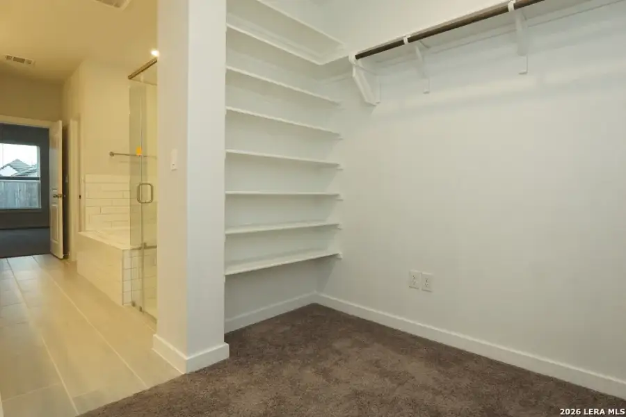 Spacious, unfurnished interior of a new home in Ladera - High Point 45', San Antonio (Image 21). Spacious, unfurnished interior of a new home in Ladera - High Point 45', San Antonio (Image 21).