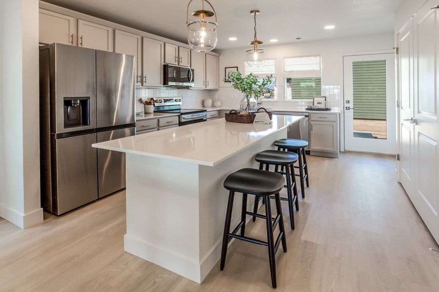 Representative furnished interior of a home built from the Magnolia by Hartford Homes in Bloom, Fort Collins (Image 15).