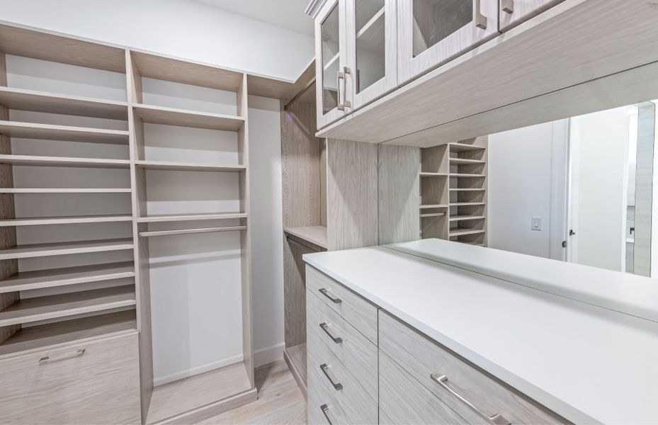 Owner's walk in closet with additional storage