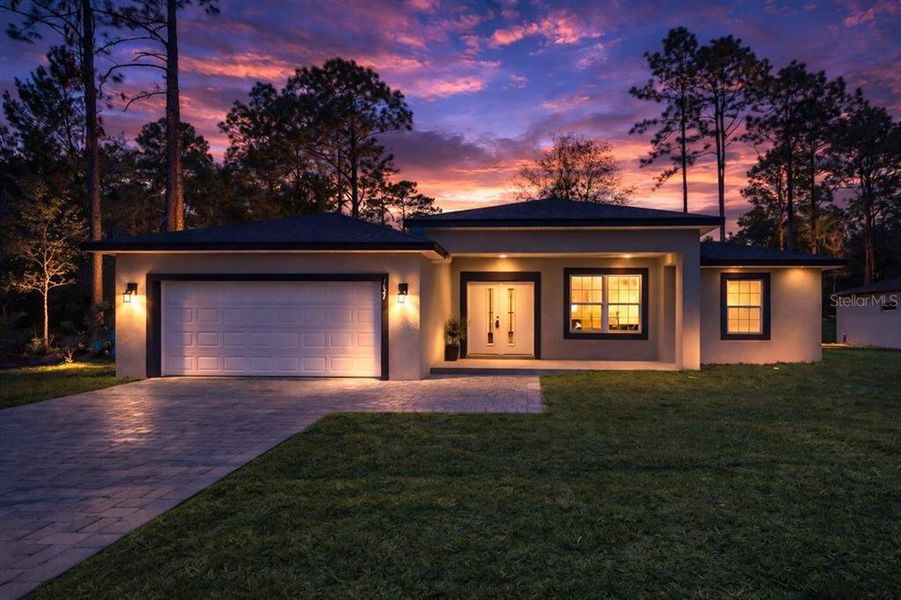 Front exterior of a new home in , Citrus Springs, FL, highlighting curb appeal (Image 27).
