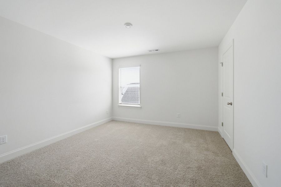 Spacious, unfurnished interior of a new home in Dorris Farm, White House (Image 53).