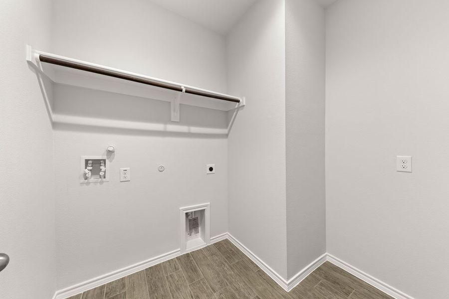 Representative exterior photo of a completed home built from the Hickory by Impression Homes in Northspur, Terrell, TX (Image 23). Representative exterior photo of a completed home built from the Hickory by Impression Homes in Northspur, Terrell, TX (Image 23).