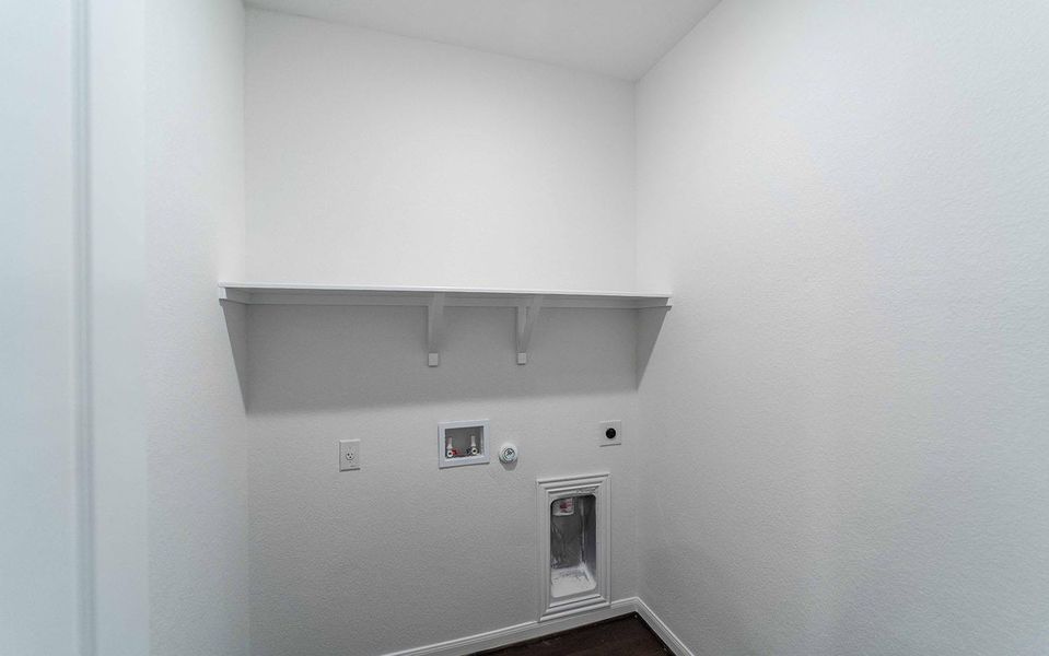 Laundry area featuring hookup for a washing machine, laundry area, hookup for an electric dryer, hookup for a gas dryer, and dark wood-style floors
