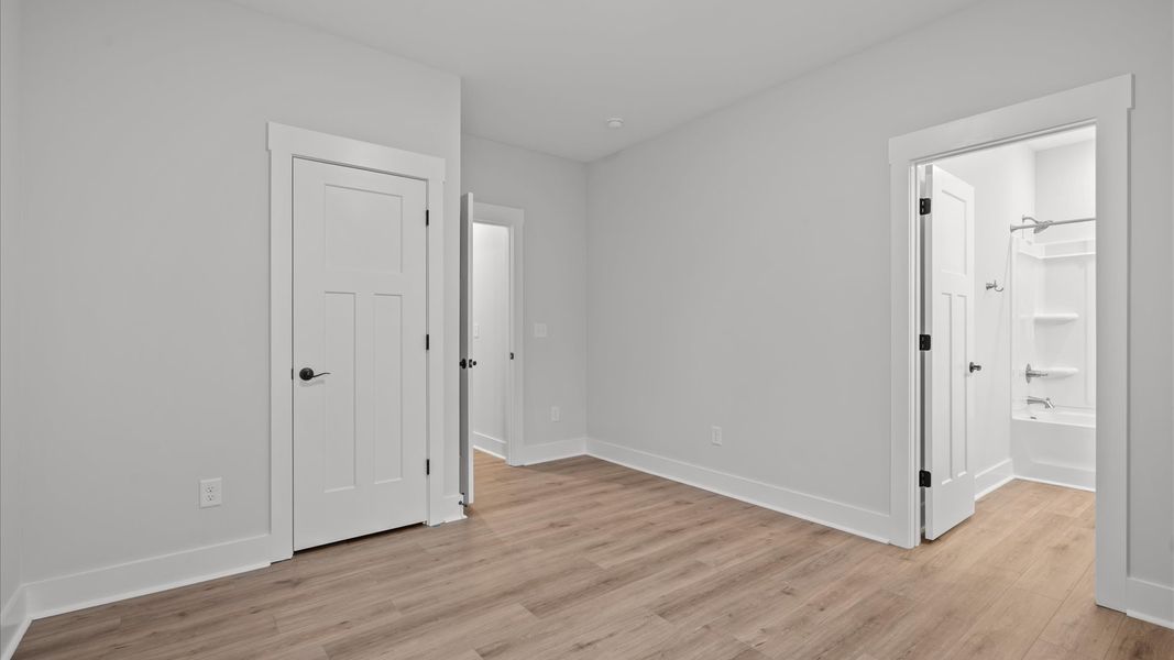 Superior hardwood flooring enhances the comfort and style of every secondary bedroom