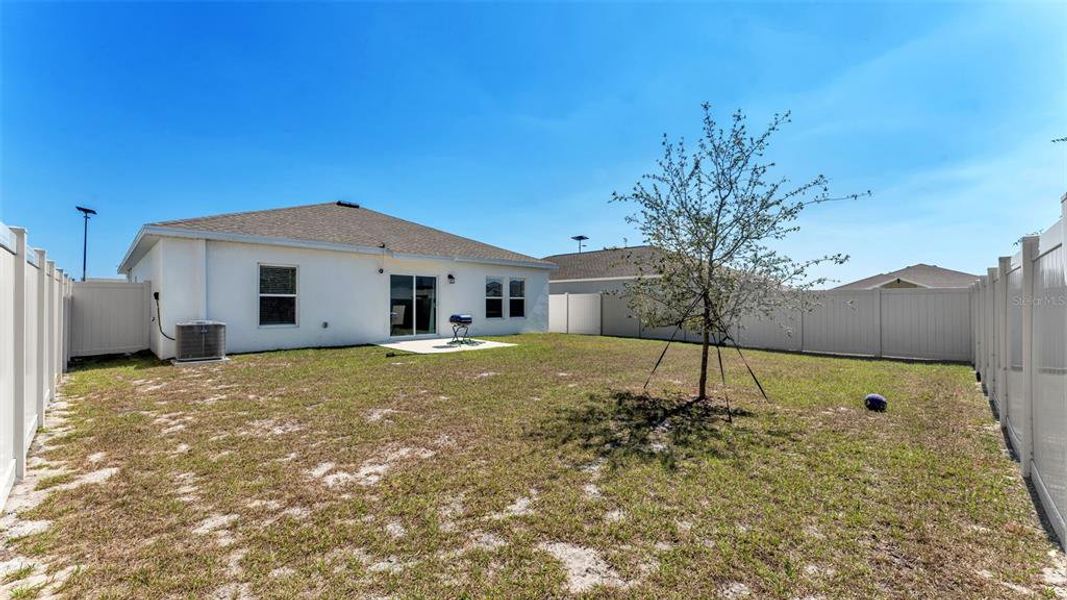 Exterior details and patio area of a home in Ranches at Lake McLeod, Eagle Lake (Image 4).
