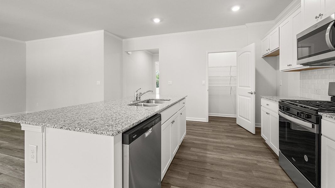 Furnished interior view inside a new home in Oaks at Cedar Grove, Fairburn (Image 8).