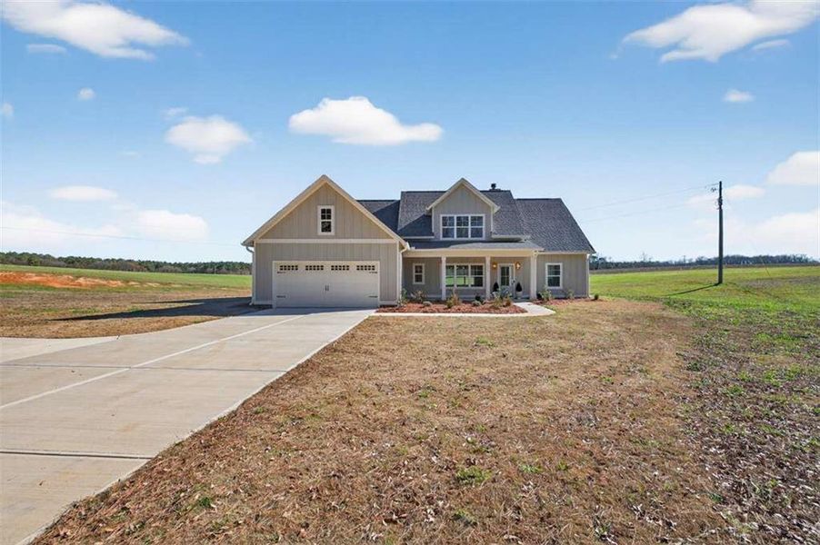 Front exterior of a new home in , Comer, GA, highlighting curb appeal (Image 28).