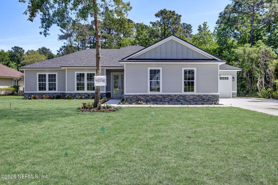 Front exterior of a new home in , Green Cove Springs, FL, highlighting curb appeal (Image 23).