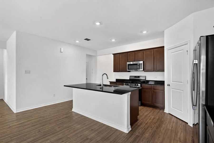 Furnished interior view inside a new home in River Ridge, Crandall (Image 6).