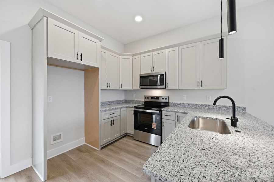 Furnished interior view inside a new home in , Monroe (Image 3).