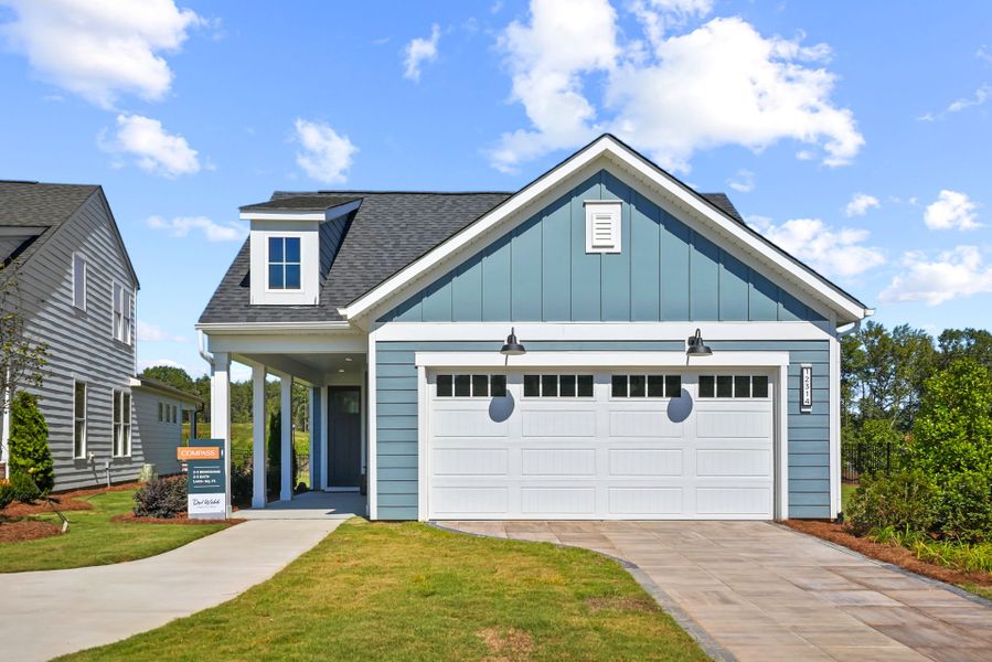 Representative exterior photo of a completed home built from the Compass by Del Webb in Del Webb Carolina Ridge, Midland, NC (Image 27).