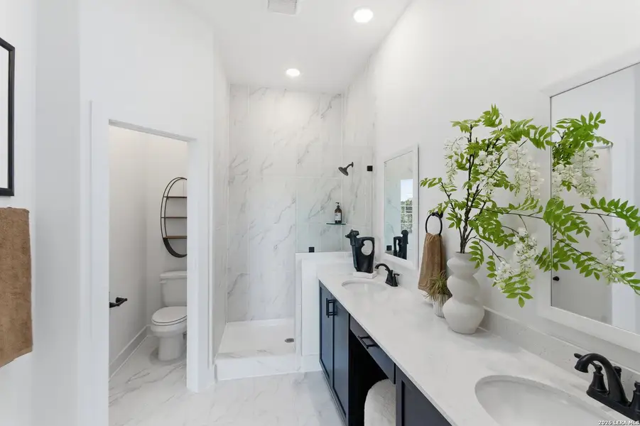 Furnished interior view inside a new home in Centero at Stone Oak, San Antonio (Image 18).
