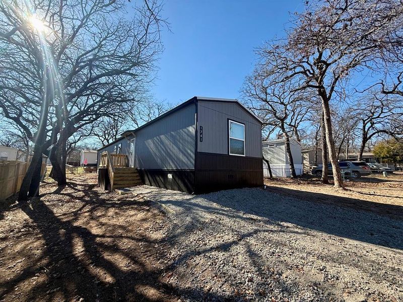 Exterior details and patio area of a home in , Pelican Bay (Image 2). Exterior details and patio area of a home in , Pelican Bay (Image 2).