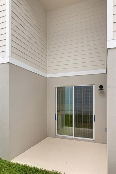 Exterior details and patio area of a home in Cypress Bluff, Groveland (Image 2). Exterior details and patio area of a home in Cypress Bluff, Groveland (Image 2).