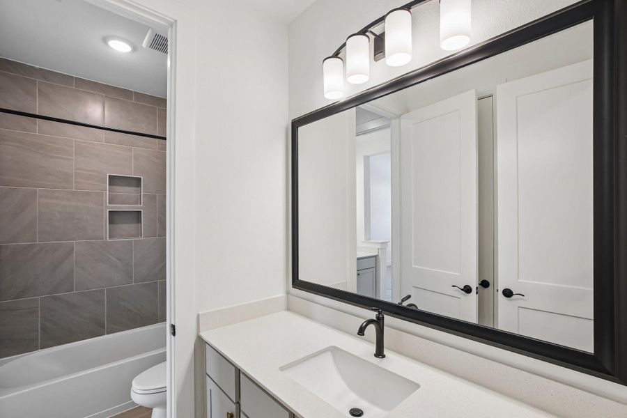 Furnished interior view inside a new home in Riceland 60',65',70', Old River-Winfree (Image 15).