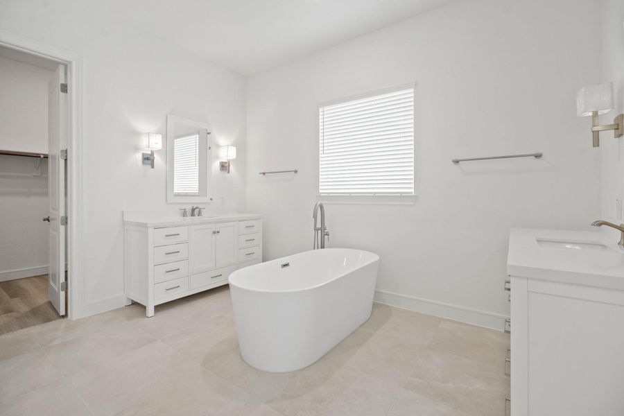Luxurious primary bath (*Photo not of actual home and used for illustration purposes only.) Luxurious primary bath (*Photo not of actual home and used for illustration purposes only.)