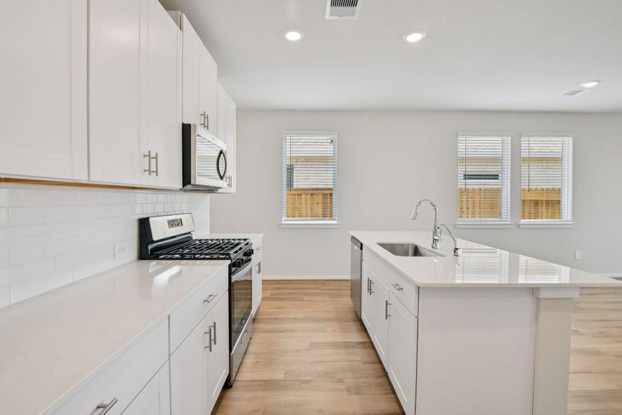 Furnished interior view inside a new home in Sanford Farms - Traditional Series, Waller (Image 16).