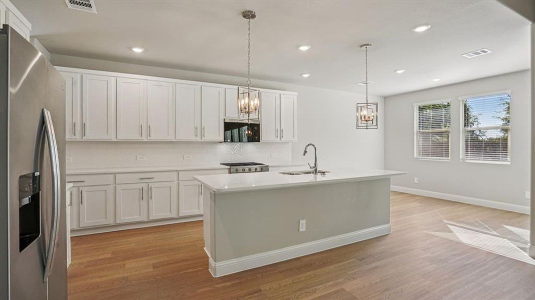 Photo is not of the actual home, but is an inspirational photo of builder’s model home and may depict options, furnishings, and/or decorator features that are not included.