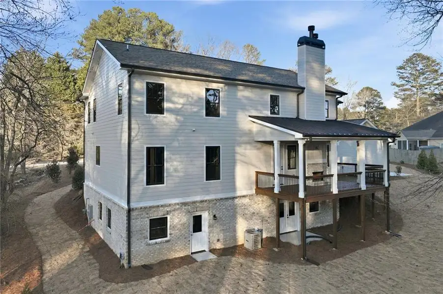 Exterior details and patio area of a home in , Buford (Image 31).