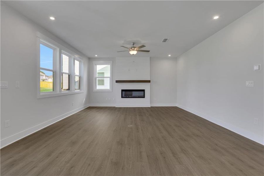 Spacious, unfurnished interior of a new home in The Paddocks at Doc Hughes, Buford (Image 42).