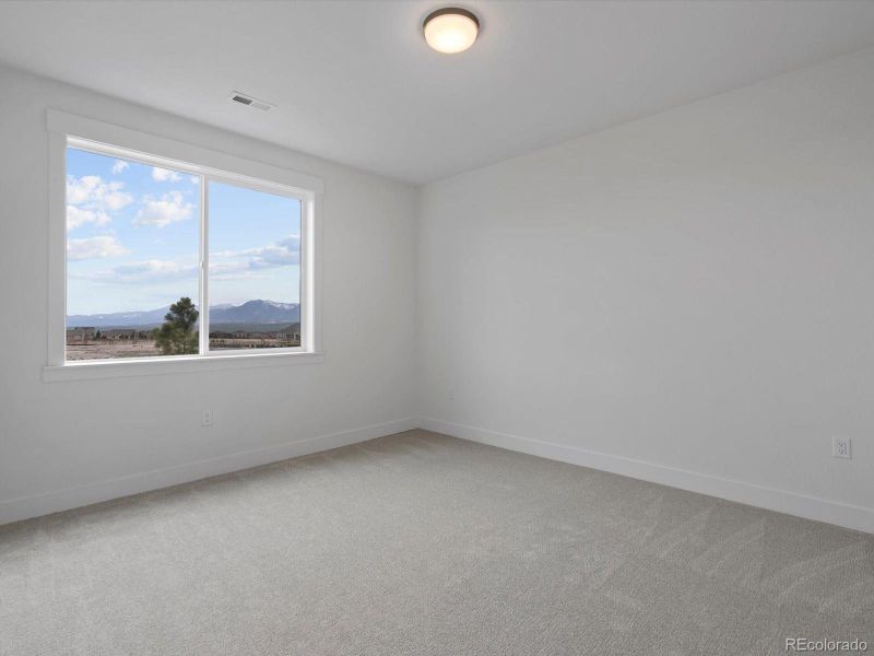 Spacious, unfurnished interior of a new home in Jackson Creek, Monument (Image 20).