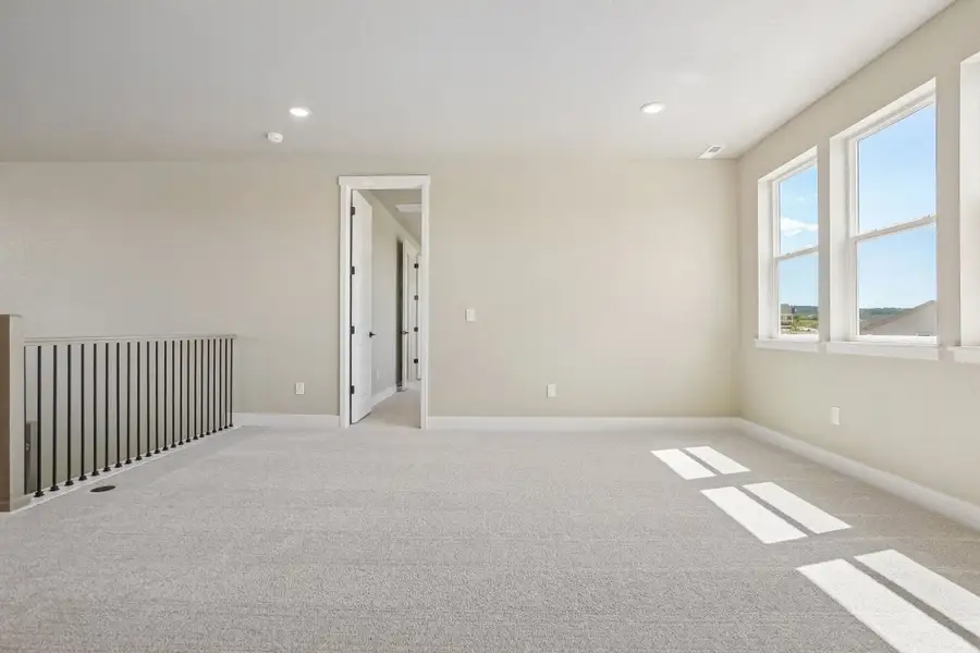 Spacious, unfurnished interior of a new home in Jackson Creek North, Monument (Image 45).