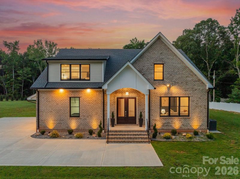 Front exterior of a new home in , Wesley Chapel, NC, highlighting curb appeal (Image 1). Front exterior of a new home in , Wesley Chapel, NC, highlighting curb appeal (Image 1).