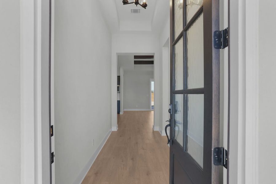Representative unfurnished interior of a home built from the Sicily by Chesmar Homes in Berry Creek Highlands, Georgetown (Image 20).