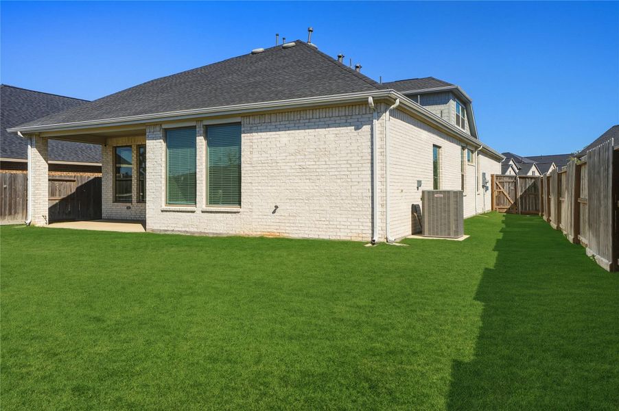 Exterior details and patio area of a home in , Fulshear (Image 32). Exterior details and patio area of a home in , Fulshear (Image 32).