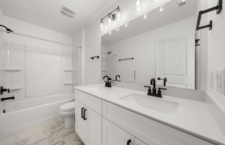 Furnished interior view inside a new home in Sunfield, Buda (Image 3).
