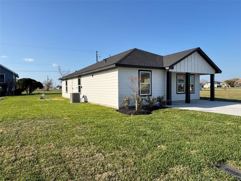 Front exterior of a new home in , Palacios, TX, highlighting curb appeal (Image 1). Front exterior of a new home in , Palacios, TX, highlighting curb appeal (Image 1).
