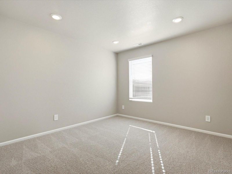 Spacious, unfurnished interior of a new home in Buffalo Highlands: The Flora Collection, Commerce City (Image 25).