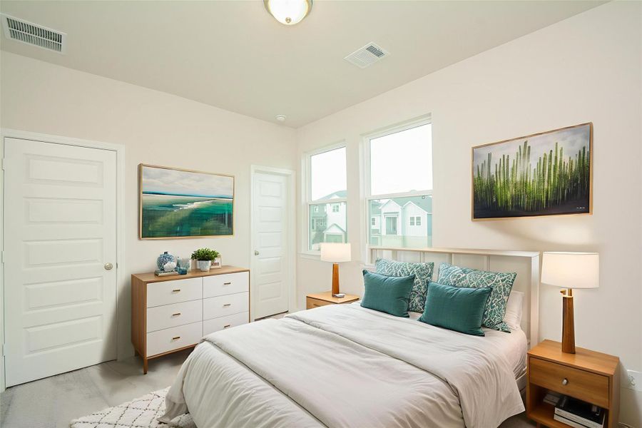 Discover the third bedroom with clean, crisp walls.