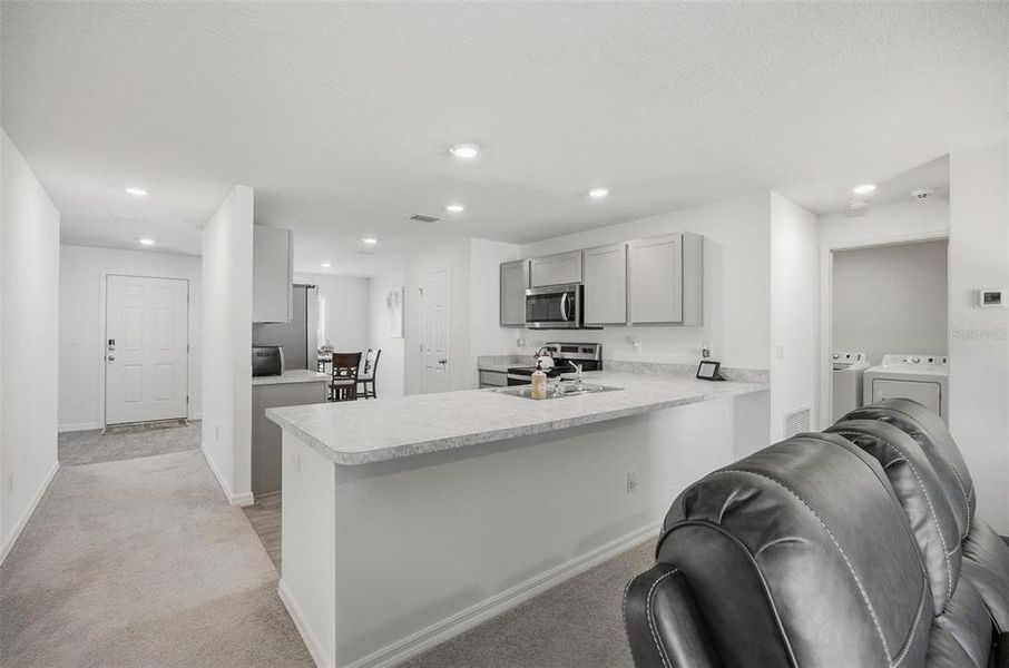 Furnished interior view inside a new home in , Palm Coast (Image 9). Furnished interior view inside a new home in , Palm Coast (Image 9).
