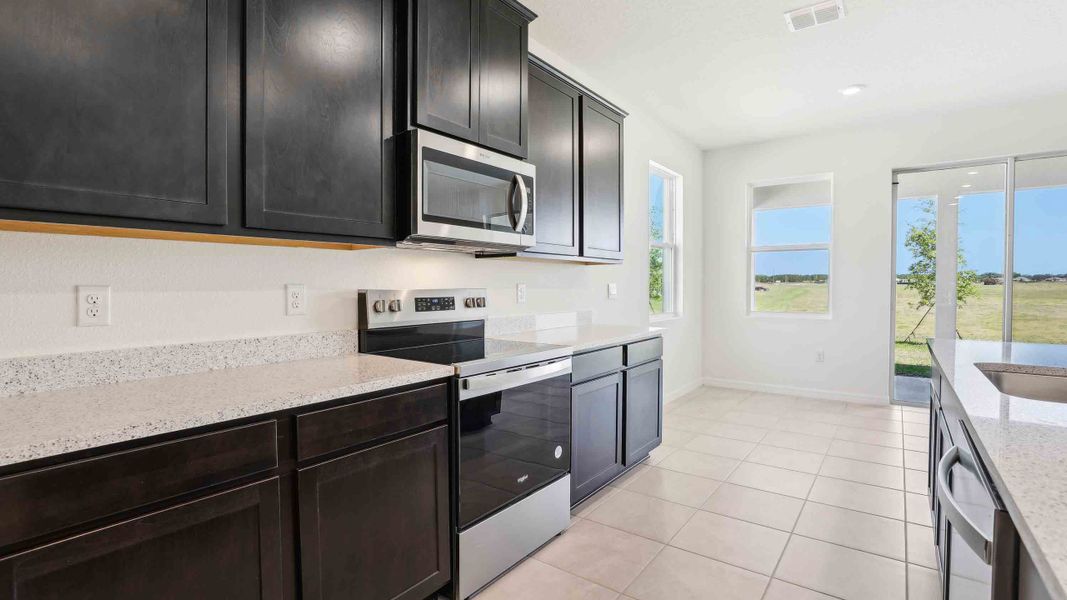 Representative furnished interior of a home built from the Laurel by D.R. Horton in Ocala Preserve, Ocala (Image 9).