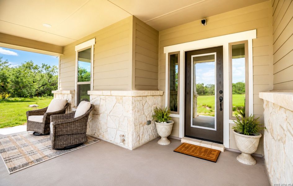 Exterior details and patio area of a home in , Devine (Image 19).