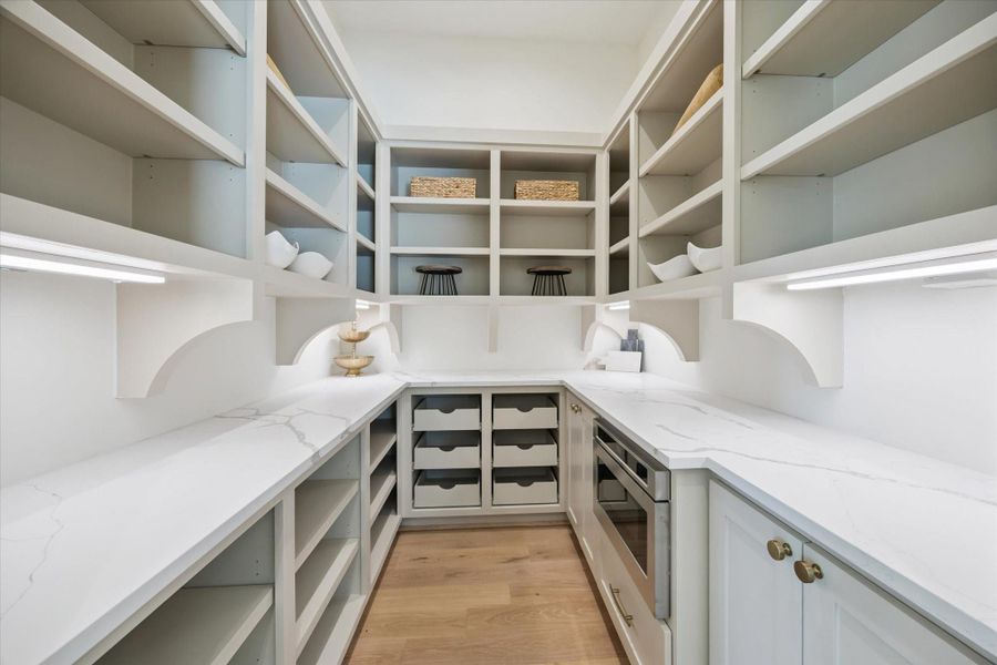 The Scullery has the ability to add another oven or two. Great storage, pull out shelving making it easier to hide the appliance usually cluttering your countertop space. The Scullery has the ability to add another oven or two. Great storage, pull out shelving making it easier to hide the appliance usually cluttering your countertop space.