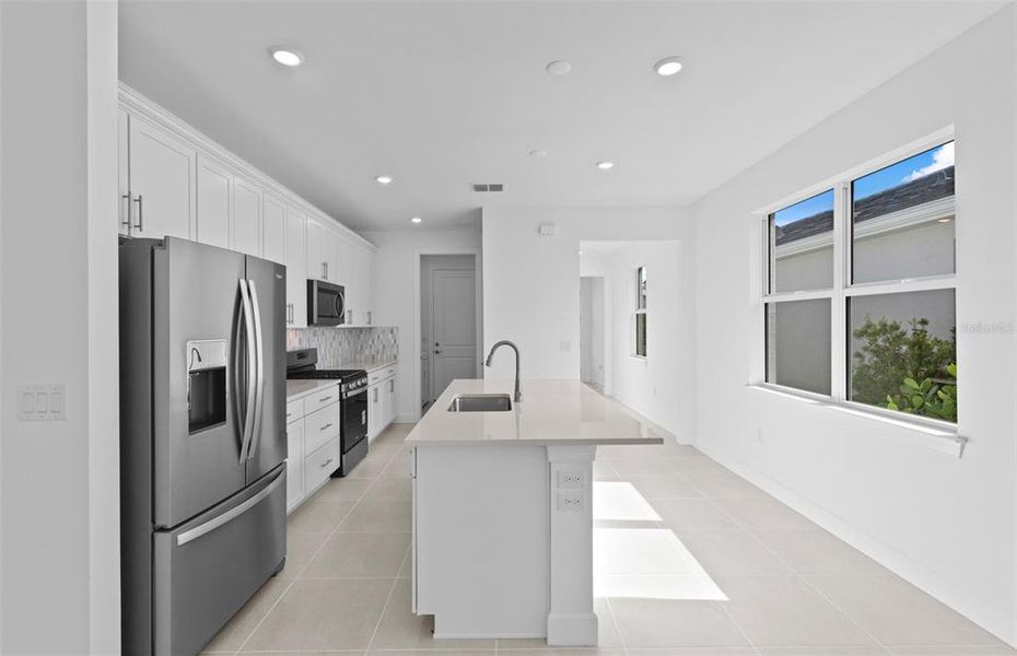 Furnished interior view inside a new home in BeachWalk by Manasota Key, Englewood (Image 8). Furnished interior view inside a new home in BeachWalk by Manasota Key, Englewood (Image 8).