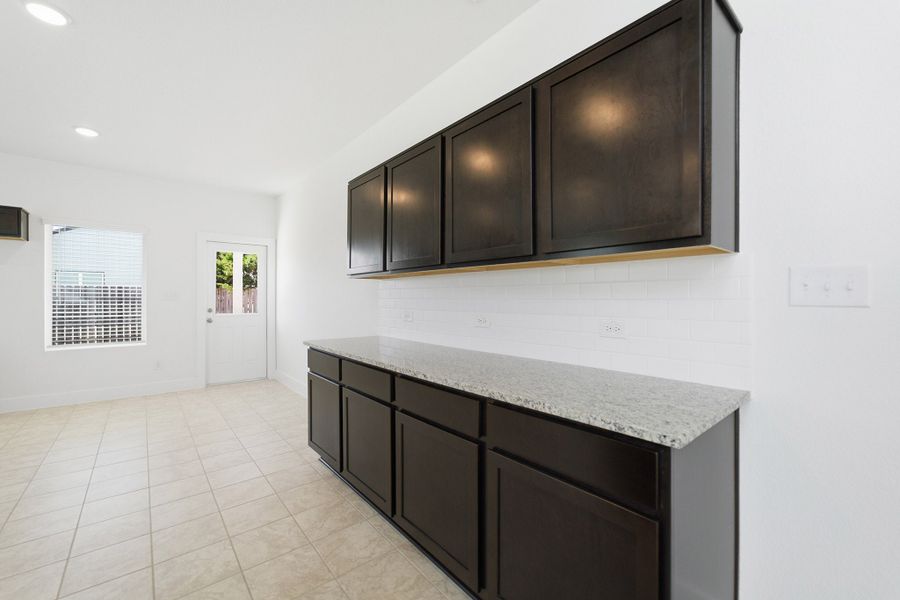 Furnished interior view inside a new home in Grande Estates, Bertram (Image 6).