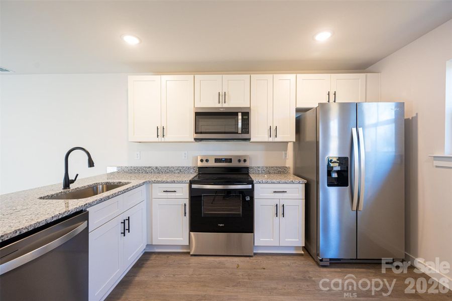 Furnished interior view inside a new home in , Hickory (Image 6).