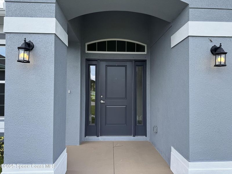 Exterior details and patio area of a home in Sebastian Highlands, Sebastian (Image 1).
