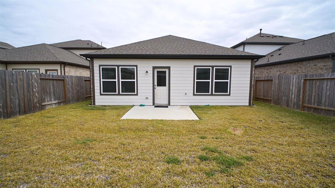 Exterior details and patio area of a home in Lonestar Collection at Aurora, Katy (Image 21).