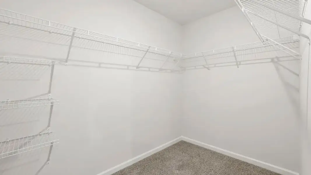 Representative unfurnished interior of a home built from the Belhaven by D.R. Horton in Lily Grove, Piedmont (Image 37).