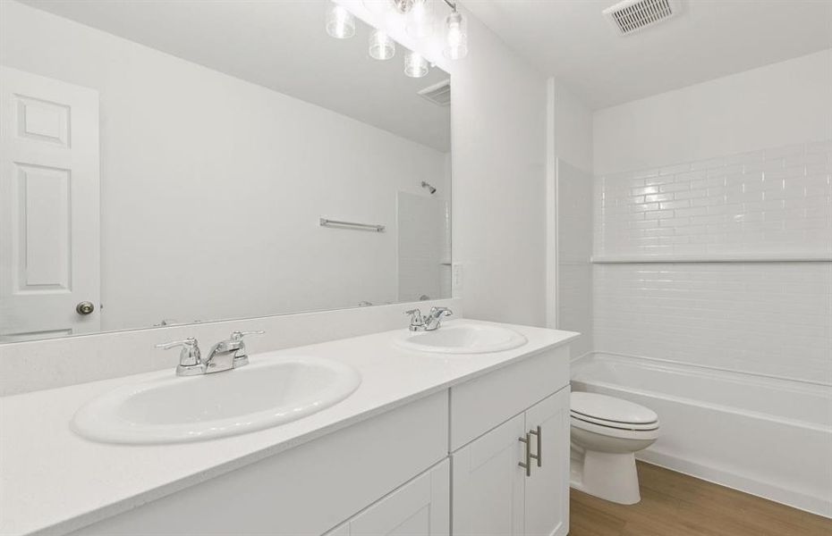 Spacious secondary bathroom with double vanity Spacious secondary bathroom with double vanity