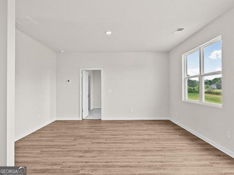 Spacious, unfurnished interior of a new home in Remington Chase, Perry (Image 13).