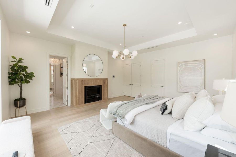 With its sculptural lighting, custom wall detailing, and glowing fire element, this sanctuary balances contemporary style with intimate charm. Thoughtfully arranged for relaxation, it’s a space designed for slow mornings, peaceful nights, and everything in between.