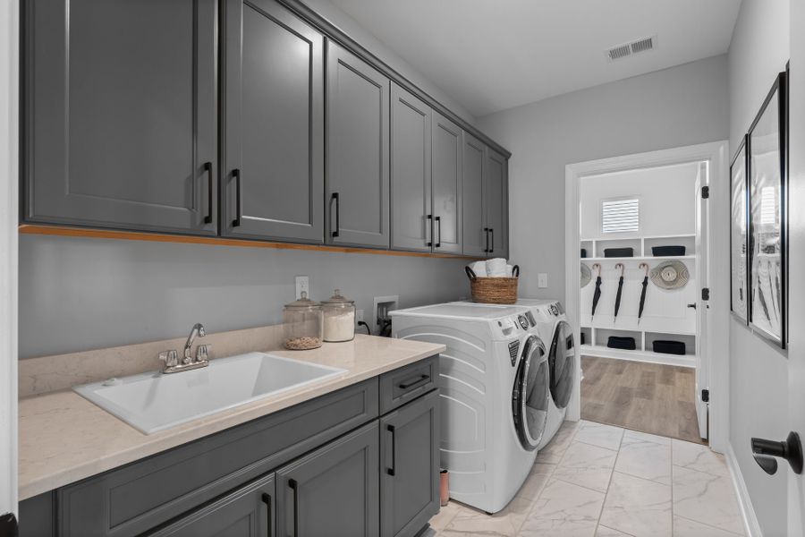 Representative furnished interior of a home built from the The Sand Dollar by Chesapeake Homes in Coastal Club of the Carolinas, Calabash (Image 28).