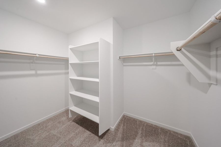 A white staircase in a room. A white staircase in a room.