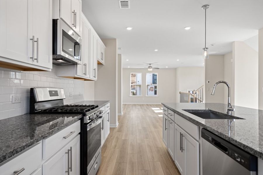 Representative furnished interior of a home built from the Collins by Taylor Morrison in Henson Square, Lawrenceville (Image 22).