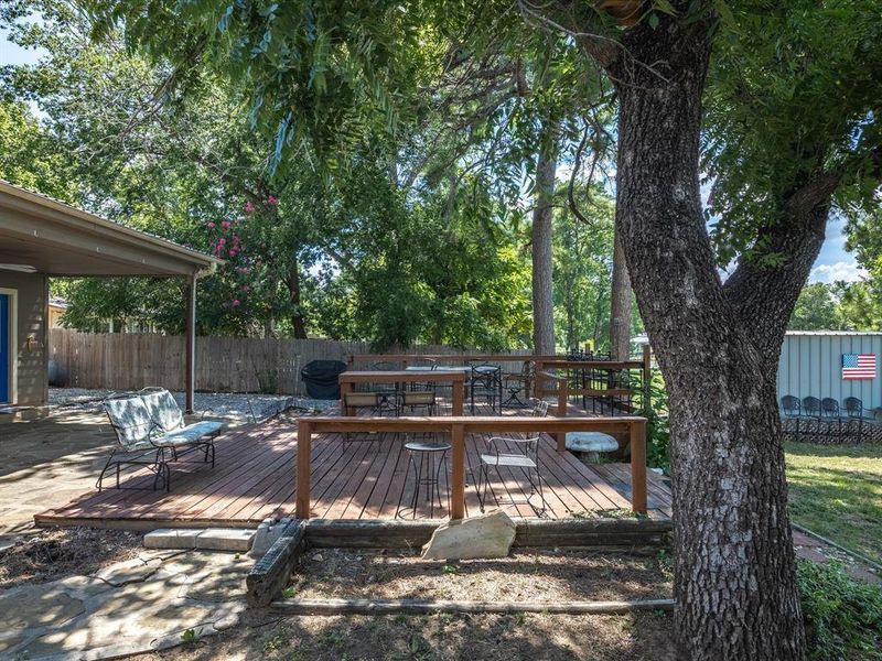 Deck featuring outdoor dining area Deck featuring outdoor dining area